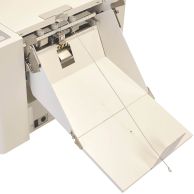 The MBM AC0648 Scorer Add-On, an 1800s scorer unit with its paper-feeding mechanism visible.