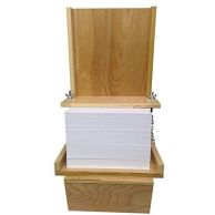 Front view of a ChamPadCo 11" Padding Press holding a large stack of paper in a wooden frame.