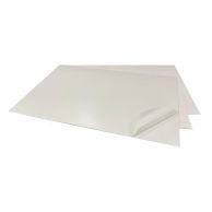 Shows several white sheets, with the top sheet partially peeled back to reveal its adhesive surface.