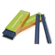Two Dark Blue 11" Medium Powis Parker Fastback Comp Strips are placed beside an open green and orange Composition Strips box, with additional strips stacked inside and partially visible.