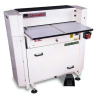 Front view of the James Burn EPX700 Automatic Binding Punch Machine showing its flat working surface, built-in foot pedal, and labeled control panel.
