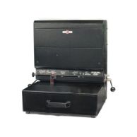 The Rhin-O-Tuff Onyx HD7725H Ultima Electric Punch (Horizontal) is a heavy-duty black binding punch machine featuring a horizontal paper feed, front-mounted controls, and a manual paper stop and handle for added precision.