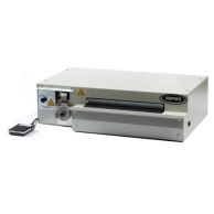 The PBS 2300 Coil Inserter and Crimper is a heavy-duty, industrial-grade machine with a beige metal body, a built-in crimping mechanism, and a foot pedal for hands-free operation, designed for high-volume spiral coil binding.