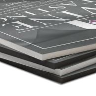 Stacked Thermal Foam Core Pouch Boards with Matte Laminate featuring a soft, non-reflective surface over printed graphics and both black and white foam core options.