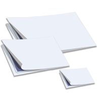 Several white Laminating Pouch Carriers in various sizes are stacked and partially opened to show their protective folded design for use in thermal pouch laminators.