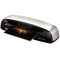 A Fellowes Saturn 3i 95 9.5" Pouch Laminator is shown laminating a dark document with a burst of orange light, highlighting the sleek silver and black design with control buttons centered above the feed slot.