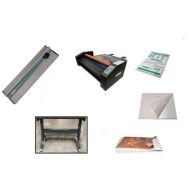 Collection of mounting and laminating tools including a rotary trimmer, thermal laminator, adhesive sheets, laminating pouches, a utility cart, and a media stand arranged on a white background.