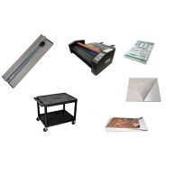 A collection of print shop tools and supplies including a rotary trimmer, laminator, rolling cart, lamination film, adhesive sheets, and printed materials.