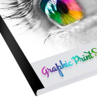 A professionally bound document with a clean, smooth edge secured by White Spine Tape for Standard BQ-P6/ 60/ 160 1-9/16 x 11", enhancing the durability and appearance of the printed material.