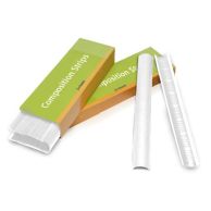 Two White 11" Narrow Powis Parker Fastback Composition Strips are positioned beside an open green and orange Composition Strips box, with a stack of additional strips visible inside the packaging.