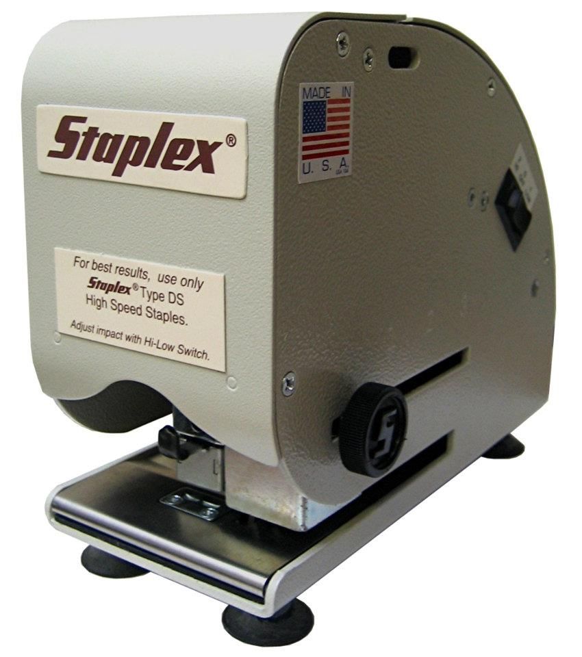 A Staplex® SJM-1N Little Giant Heavy Duty Automatic Electric Stapler is shown from a slight angle, highlighting its "Made in U.S.A." label.
