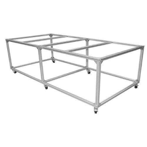 A rectangular 4' x 8' Aluminum Mobile Table Frame made of silver aluminum bars, with a grid-like top structure and black caster wheels on each corner.