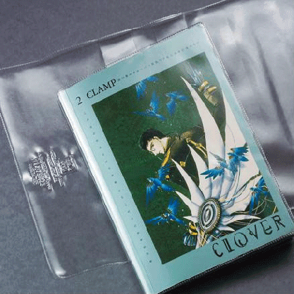 A graphic novel is partially inserted into clear Adjustable Book Covers, showing the protective plastic sleeve designed to fit various book sizes.