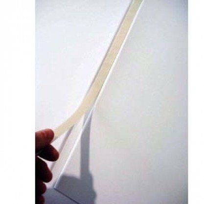 A hand is peeling back a strip of adhesive from a white surface, demonstrating the application of Coverbind FlexiGlue Print On-Demand Thermal Binding Glue Strips.