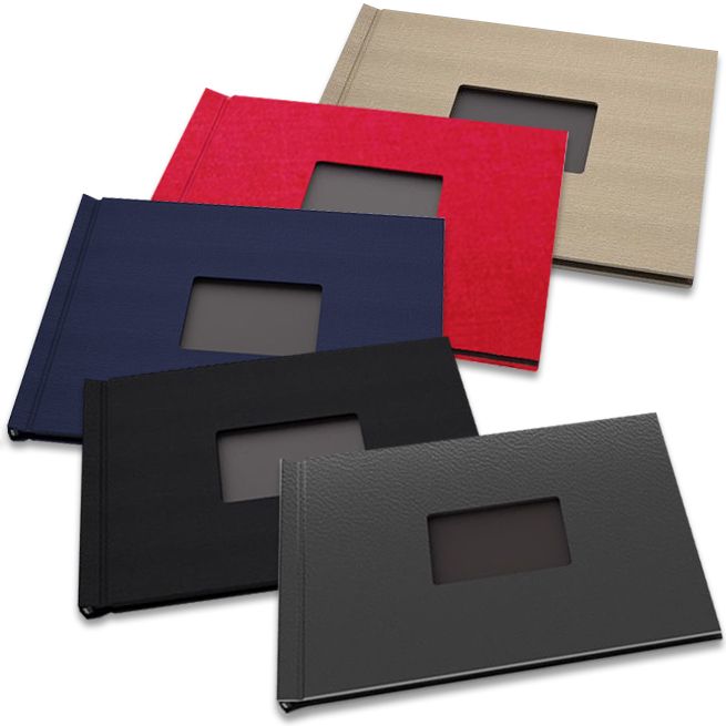 A variety of 8-1/2" H x 11" W Landscape Pinchbook™ Hardcover Photo Books with Window, shown in different colors including black, navy, red, and beige, each featuring a rectangular window on the cover.