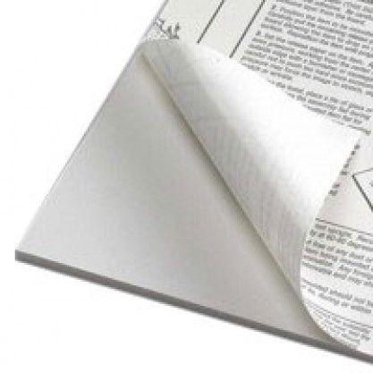 Shows a corner of a White Self Adhesive Foam Mounting Board with its protective backing partially peeled back, revealing instructions on the adhesive side.