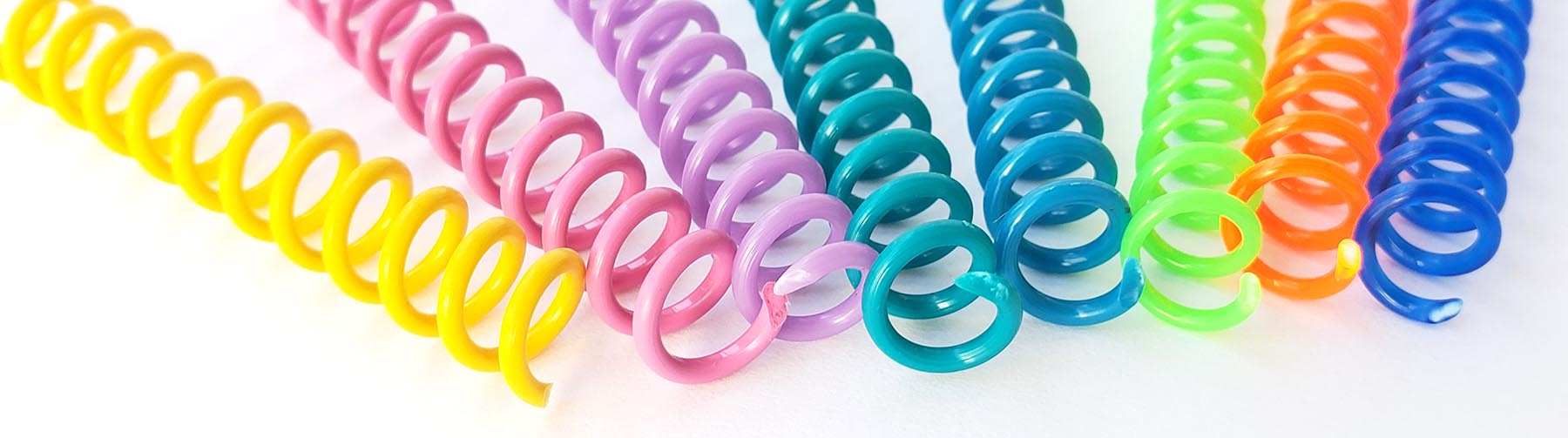 Yellow, pink, purple, teal, sky blue, neon green, orange, and blue spiral coils. 