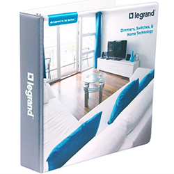 Custom vinyl ring binder featuring a modern living room design with blue accents, branded by Legrand.