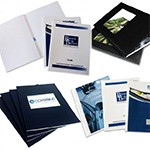 Various binding educational documents displayed in different formats and covers.