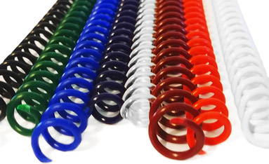 A close-up image of colorful spiral binding coils arranged in a row, featuring black, green, blue, white, red, brown, and white coils.