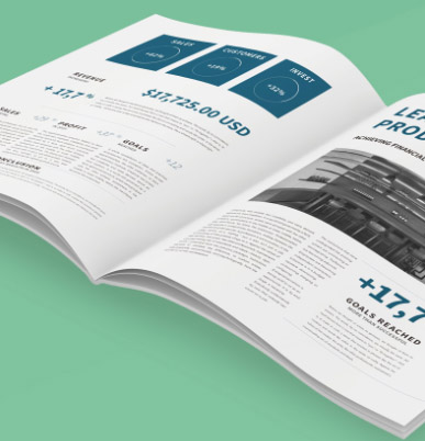 An open booklet showcasing financial data with Fastback thermal strips delivering true lay-flat binding for a sleek and professional finish.