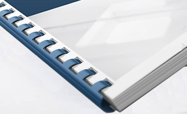Close-up view of plastic comb bound documents with a blue plastic combs and clear covers.
