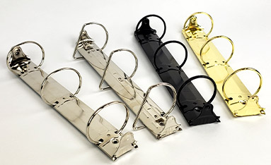 A set of four ring binder mechanisms in different colors, including silver, black, and gold.