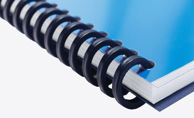A close-up view of GBC ProClick bound documents with a blue cover and navy binding Pro-Click spine.