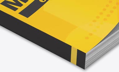 A paperback soft cover perfect bound book with a bright yellow and black cover design featuring a dotted pattern.