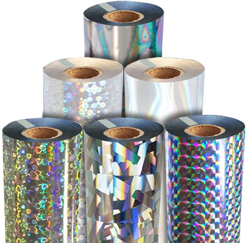 A collection of holographic foil rolls in various patterns and designs, reflecting vibrant, iridescent colors.