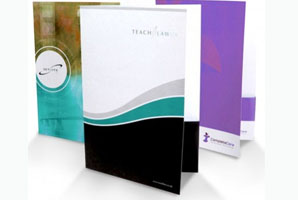 Assorted custom printed pocket folders with unique designs displayed upright.