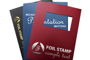 Custom binding covers with foil stamping in black, blue, and red designs showcasing professional presentation quality.