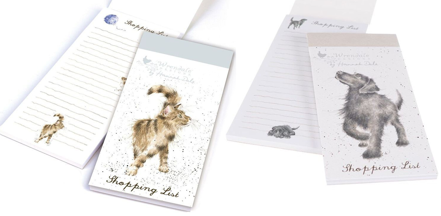 Decorative notepad shopping lists featuring hand-drawn animal designs, including a cat and a dog, on the cover and inside pages."